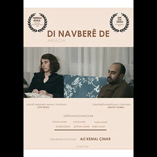 Wêneyek ji fîlma Di Navberê De